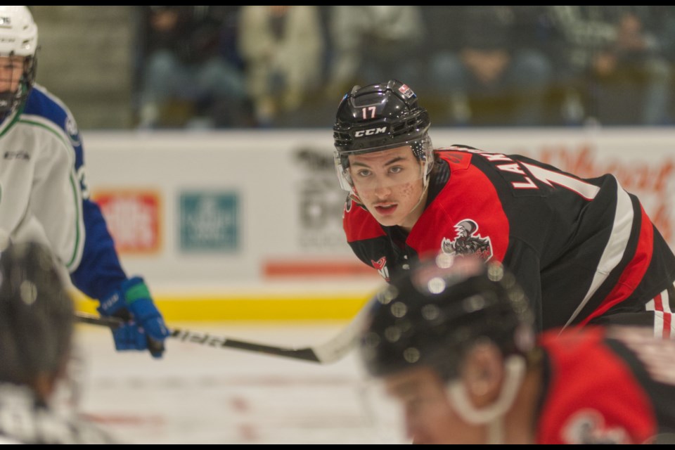 Warrior Lynden Lakovic waits for the puck to drop.