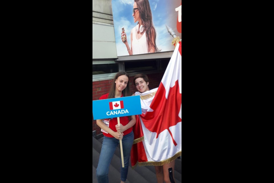 Estevan’s Josephina Hlohovsky Andrist, right, with Serbian volunteer Nadja Kraguli at the Women’s World Youth Water Polo Championships in Serbia. 