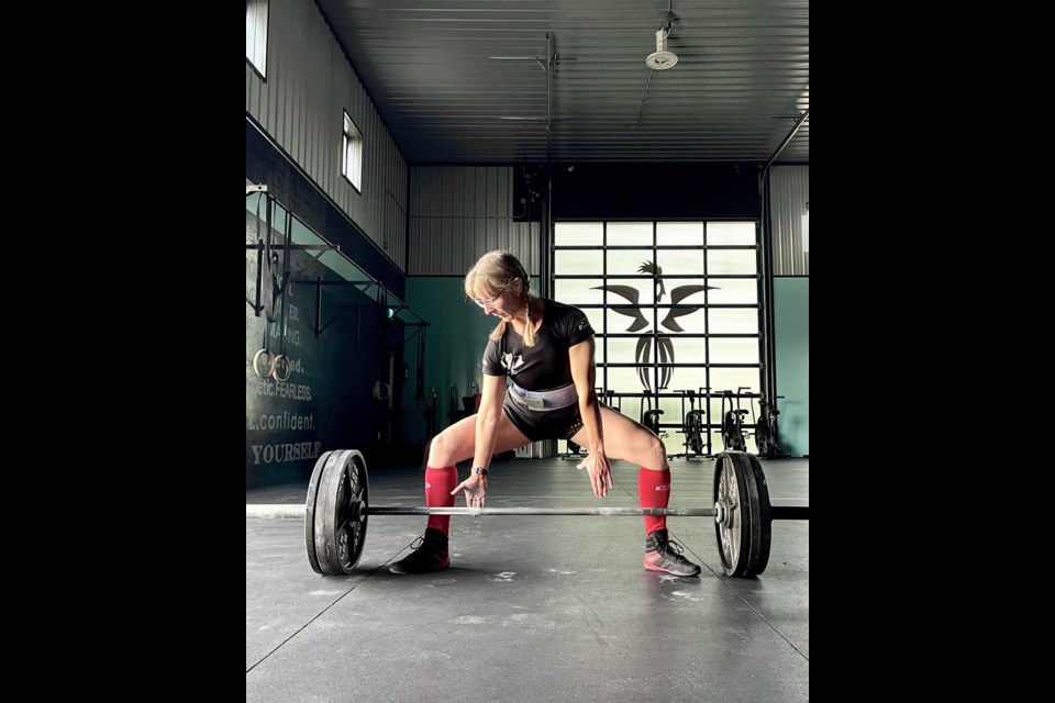 Training for an experience with Team Canada powerlifting in October, Unity athlete, Shauna Hammer, spends time in preparation at Unity's Fitness Lair.