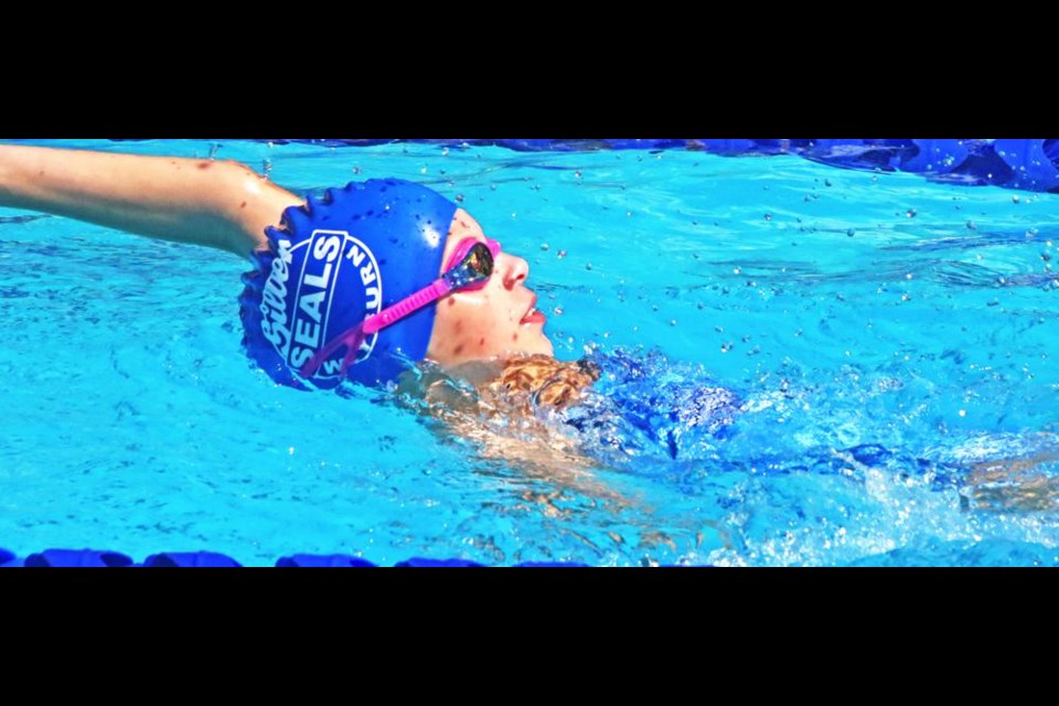Swimmer Daisy Popescu swam in the 11-12 girls backstroke event on Saturday.