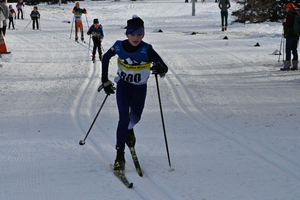 Charis Maier of Preeceville gave her best shot and won first in  U10 age category in the Alberta Cup cross-country race.