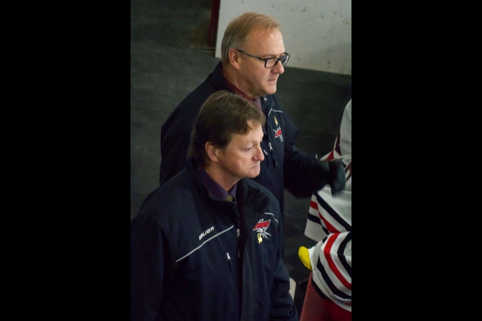 Long time Midget AA hockey coaches, Stan Weber and Dwayne Scott, have called it a career after more than 25 years coaching