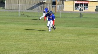 Backed up by left fielder Derek Palagian, Supers shortstop Ian Quewezance fielded this ground ball and threw out the Langenburg runner at first base on the way to a 13 to 4 win in Canora in Game 1 of the first-round playoff series.