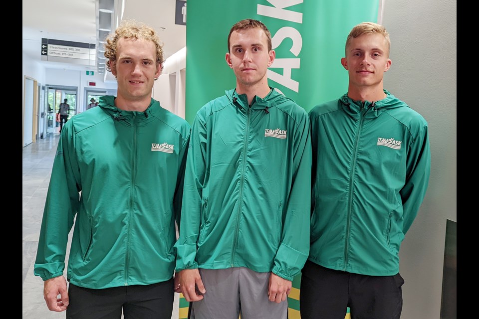 Bradyn Giraudier (24), Kyle Giraudier (21), and Logan Fettes (22) are competing in athletics, during the 2022 Canada Summer Games. 