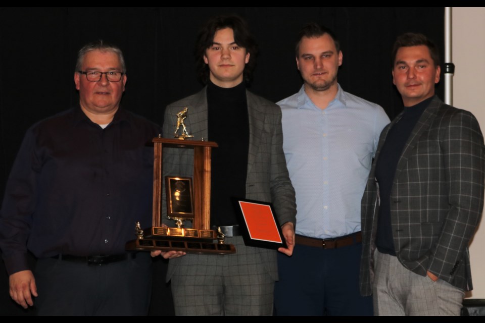 The Most Valuable Player Guy Lamb Memorial went to Dylan Ruptash. From left Terrier assistant coach Scott Musqua, Ruptash, head coach Mat Hehr and assistant coach Zach Rakochy.