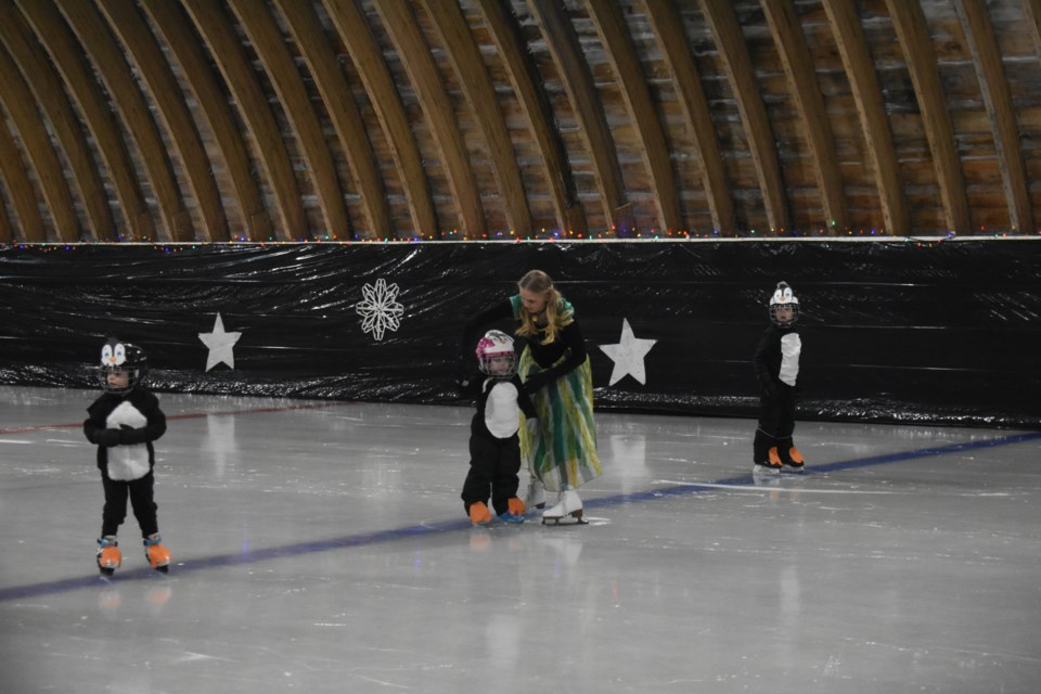 The Beginner Group took to the ice with enthusiasm, skating to the song Crazy Feet from the Happy Feet soundtrack. In no particular order, Ryker Barrowman, Charlie Musclow, Claudia Musclow, and Sophia Perepiolkin delighted the audience with their young skating skills.
