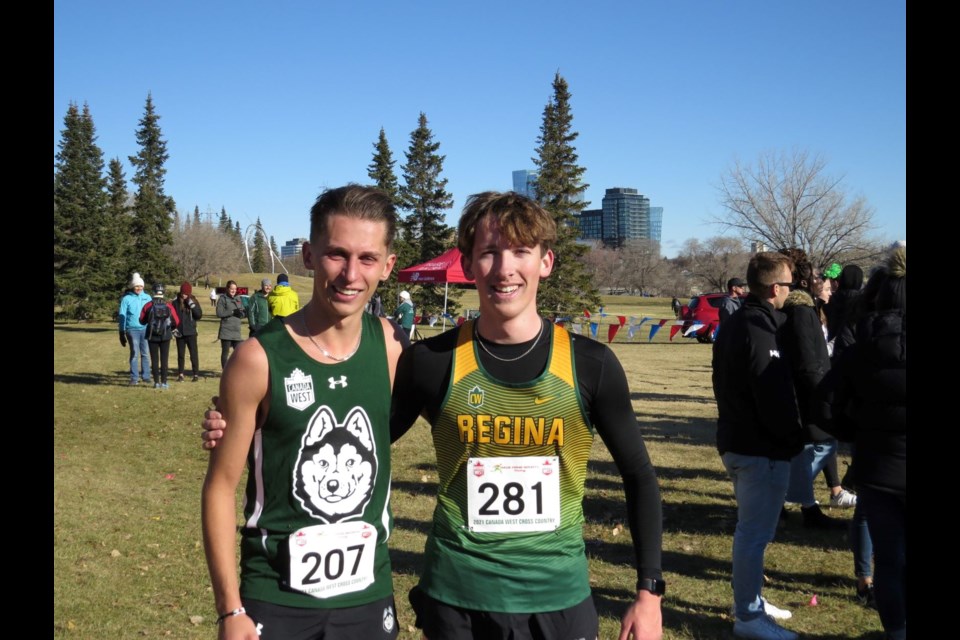 Trey Pernitsky, U of S Huskies, and Reece Gilbert, U of R Cougars, compete at the Can-West CIS Conference Cross-Country Championship Oct. 30.
