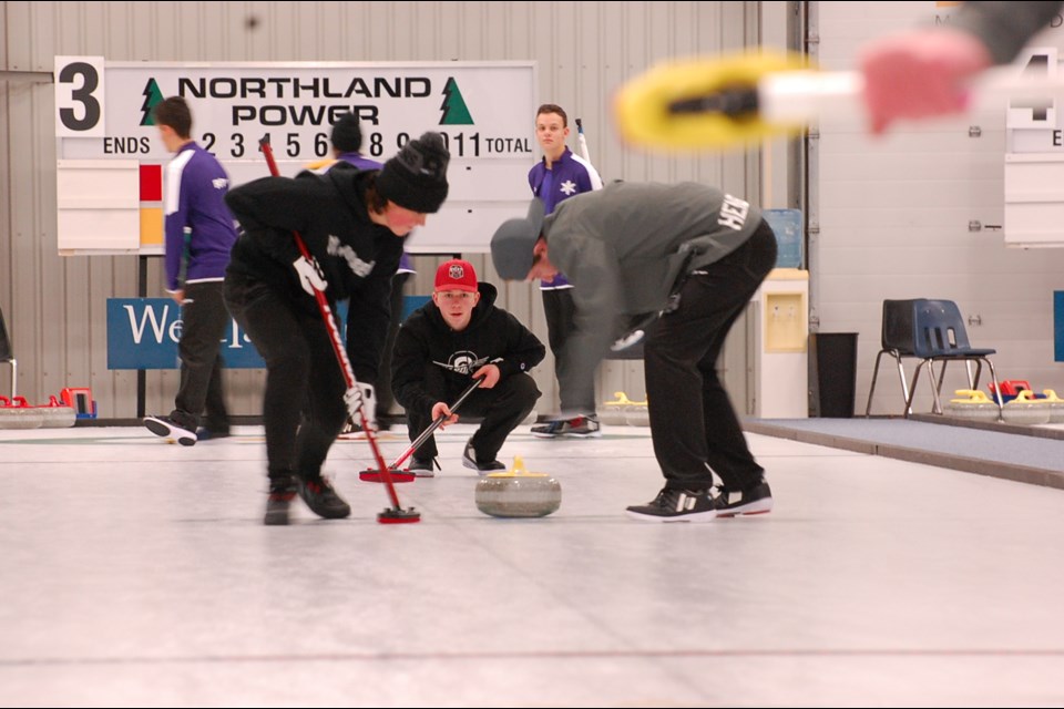 Action from the boys' side at the U18/U15 bonspiel at Twin Rivers Curling Club.