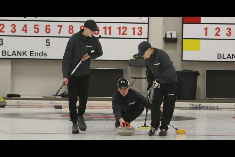 The Humboldt Curling Club hosted the South 20 Dodge U18 Boys and Girls Open Provincials from Dec. 27 to 30. In this photo, Team Derksen delivers a rock.