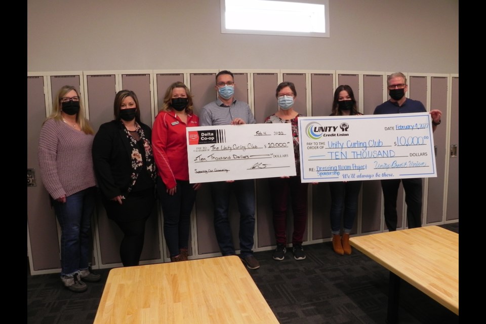 Unity Curling Club representatives pose with contributors to the completion of the addition at the Unity Curling Club, which offers a number of benefits to curlers and curling rink users.                        