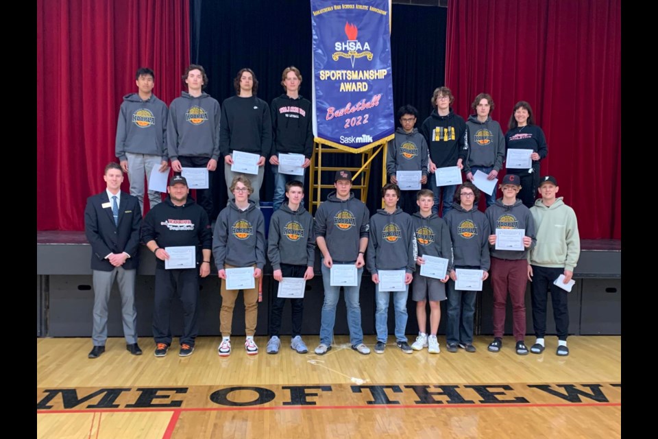 UCHS Senior basketball team with their newly presented SHSAA sportsmanship award. Top row: JP Aguinaldo, Jesse Deck, Xander Tiffin, Denim O’Donnell, Ralf Virtudez, Braedon Coons, Quinn Krpan, Mrs. Kyla Snell(manager)
Bottom row: Mr. Jeff Kitts (assistant executive director for SHSAA), Jeremy Wagner(coach), Layne Parker, Thomas Snell, Logan Middleton, Cooper Lewin, Zayden Wagner, Jack Brebner, Ethan Stifter, Quinn Maze (coach).