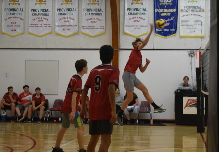 Henry Craig went high to hammer down this spike for the CCS junior boys volleyball team in a match versus the visitors from Norquay on Sept. 27, supported by teammates Ira Mykytyshyn (left) and Pierre-Juan Rollin.
