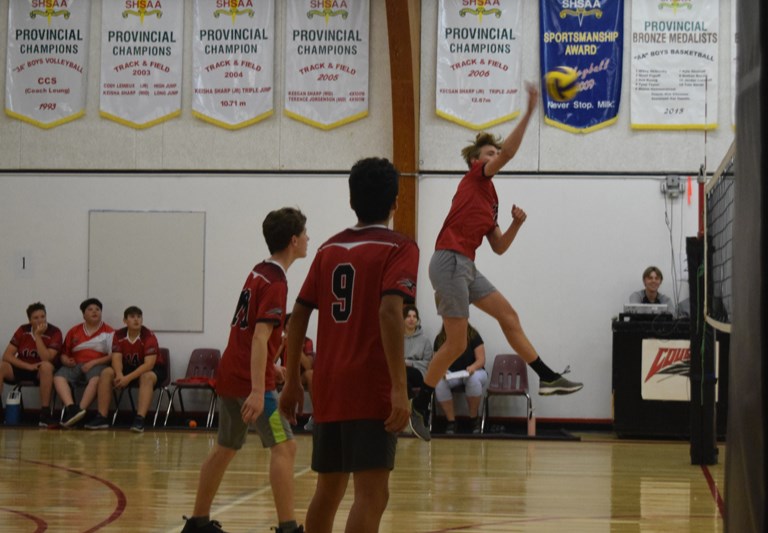 Henry Craig went high to hammer down this spike for the CCS junior boys volleyball team in a match versus the visitors from Norquay on Sept. 27, supported by teammates Ira Mykytyshyn (left) and Pierre-Juan Rollin.
