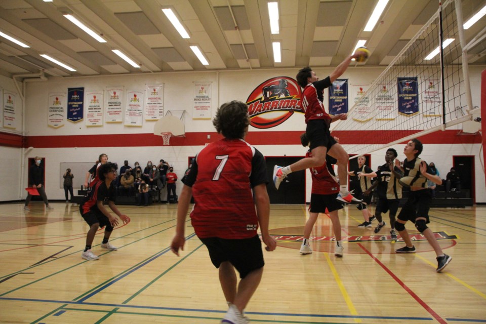 No. 10, Jesse Deck, of the UCHS Warriors in game action at SHSAA 3A Regional volleyball championships.