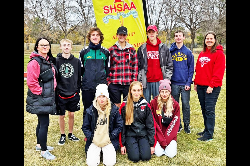 The Weyburn Comp Eagles cross country team gathered after competing on Saturday in Regina. In the back from left are coach Brandy Zieglgansberger, Lucas Zieglgansberger, Camden Husband, Mason Sidloski, Calder McMillian, Wylie Kopec, coach Kristy Gall, and in front, Rylie Gervais, Jyllian Payak and Autumn Vilcu.
