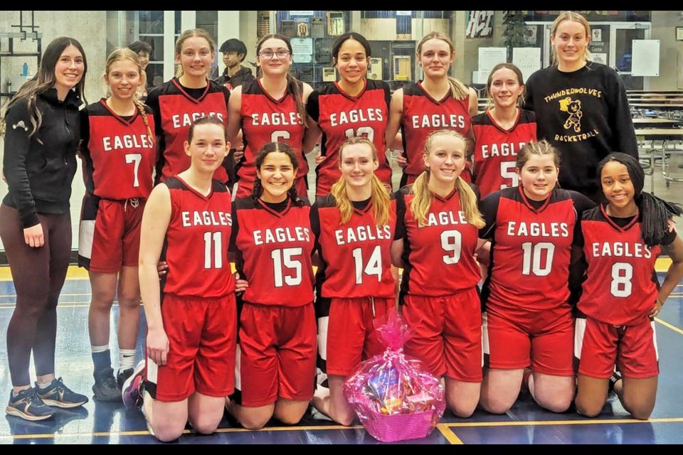 The Weyburn Comp Eagles senior girls basketball team gathered after winning first place at a tournament in Humboldt over the weekend. In the back row from left are coach Hailey Neiszner, Zoe Kerr, Angelina Millar, Mya Sanderson, Tamberly Kreger, Cadence Wawro and coach Skyler Kreger. In front from left are Sela Flavel, Carlee Wade, Aycen Schwindt, Nikola Erasmus, Jenna Knupp and Faith Magawa. Missing is coach Karly Johnson.