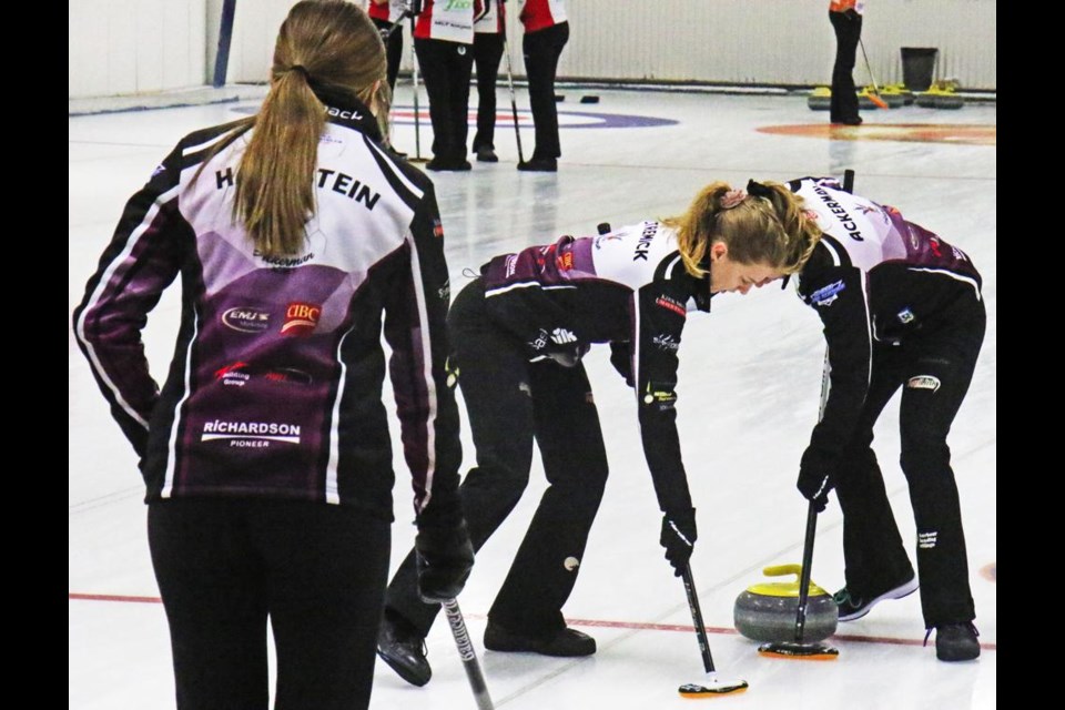 Weyburn skip Emily Haupstein watched as second Taylor Stremick and third Skylar Ackerman swept the shot made by lead Abbey Johnson in their game versus Michelle Englot's rink at the Weyburn Curling Rink for the Sask Women's Curling Tour. Team Haupstein will compete at the 2022 Junior Provincials this weekend in Martensville