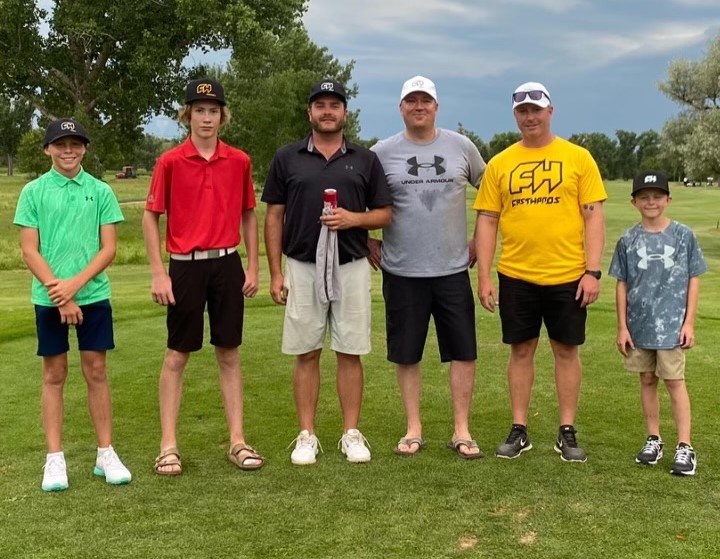 From left, junior golfers Broden Henry and Boston Tait, long drive competition winner Preston Erickson, runner-up Brock Simpson, Darcy Henry with FastHands and junior golfer Braylon Henry.  