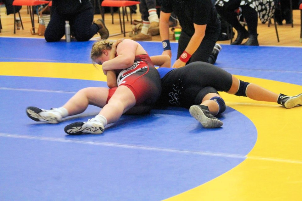 McLurg Broncs wrestler, Piper Kent, in action at regional wrestling March 4-5