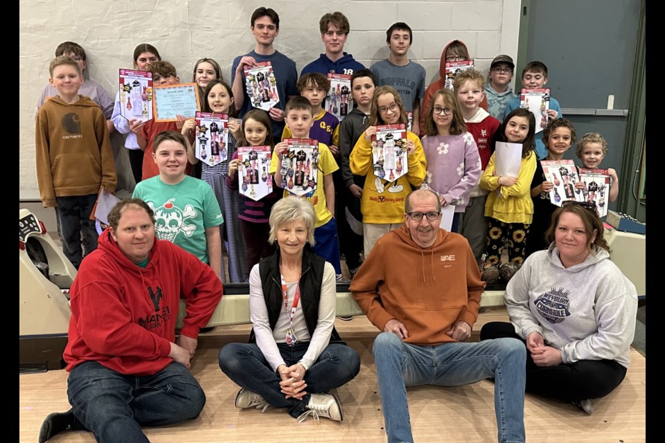 The entire group gathered together for the awards. In the back row, from left, are Theo Frazer, Hailey Caldwell, Gracelyn Callan, Stuart Dunn, A.J. Bratrud, Kelsey Hovanak, Rhett Pierce, Dominic Scrupps, and Owen Maas. In the third row, from left, are Damien Scrupps, Everett Roy, Alexa Galacz, Cooper Loos, Lance Caldwell and Kohen Callan. In the second row, from left, are Ryker Walliser, Emma Galacz, Cooper Walliser, Isabell Loos, Avery Loos, Piper Loos, Luka Jones, and Leo Jones. In the front row, from left, are coaches Kasey Fowler, Leslie Walliser, Joe Callan and Geri-Rae Callan. Missing from the photo were Alydia Hovanak, Jacob Selte, Titus Aronson and Hudson LaFleur.