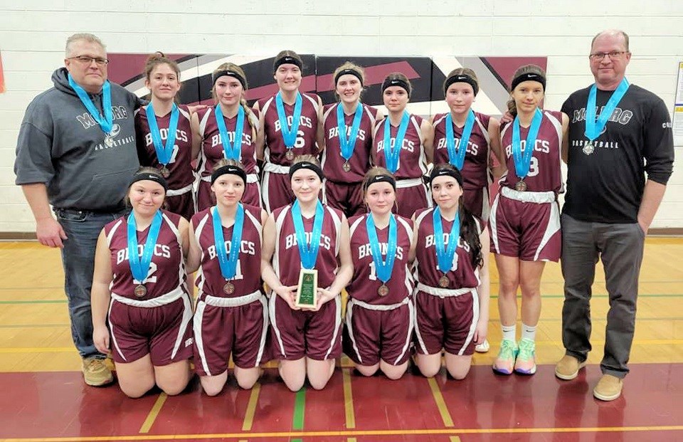 The McLurg Broncs girls' basketball team, provincial silver medallists. Left to right: back row, Coach Mark Myszczyszyn, Taylor Bantle, Kierra Babchuck, Reese Fenrich, Cheyanne Cey, Serena Schmidt, Joelle Lovem, Hailey Hyland, Coach Jeff Hyland; front row, Erin Squires, Hanna Hyland, Navaeh Lang, Tyra Myszczyszyn, Alara Lang.