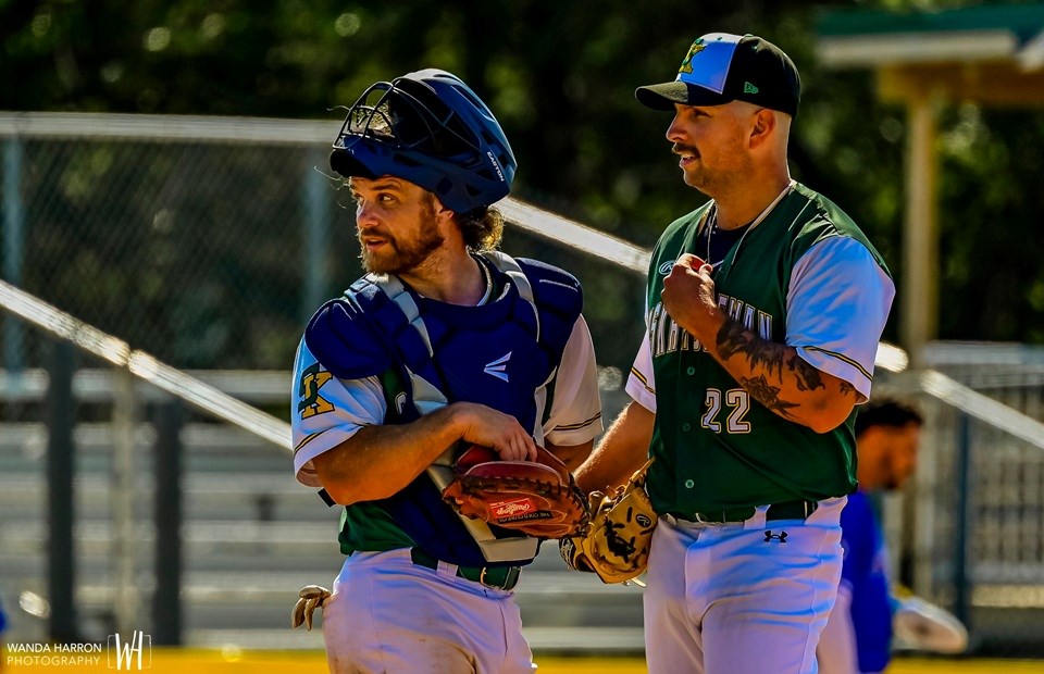 Catcher Braden Polreis and pitcher Rhett Feser, both of Unity, take a moment during the Saskatchewan vs Quebec game to talk strategy at the 2025 National Men's Baseball Championships.