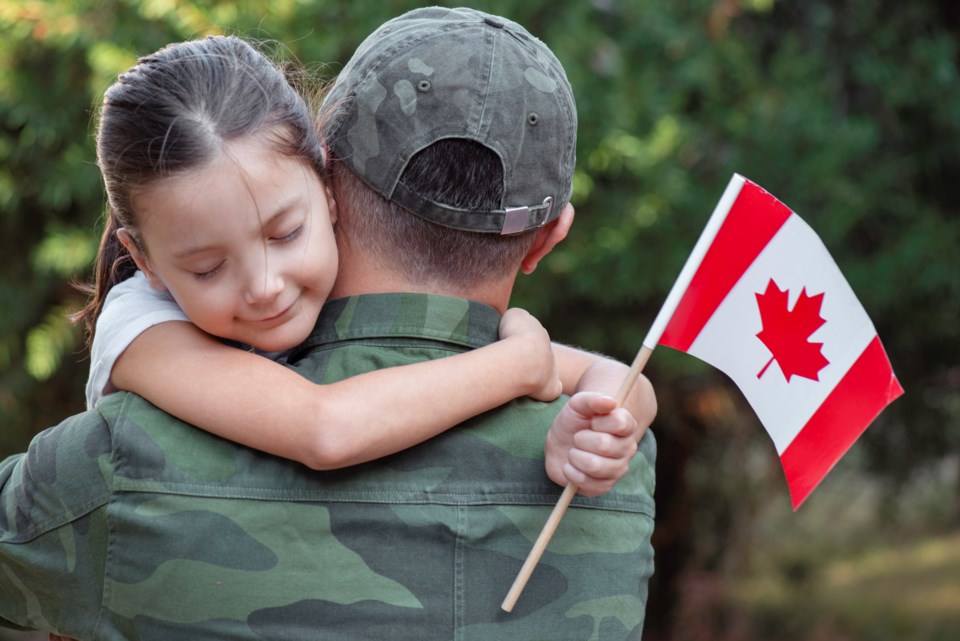 Canadian soldier and daughter
