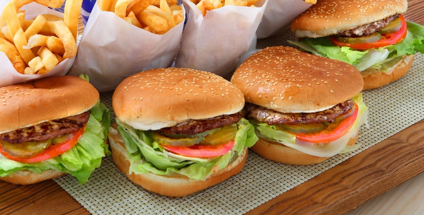 Four Hamburgers with French Fries