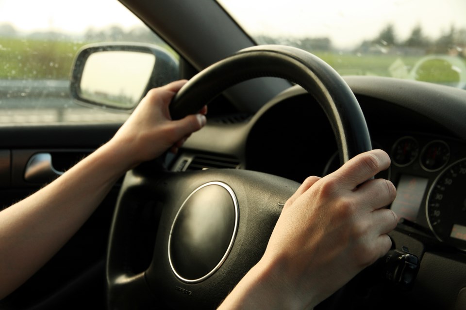 hands on steering wheel