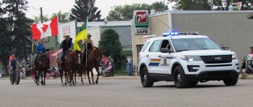 RCMP, flag bearers Diane and Dale Kieper and bike riders participated in the Radisson Fair parade.                 