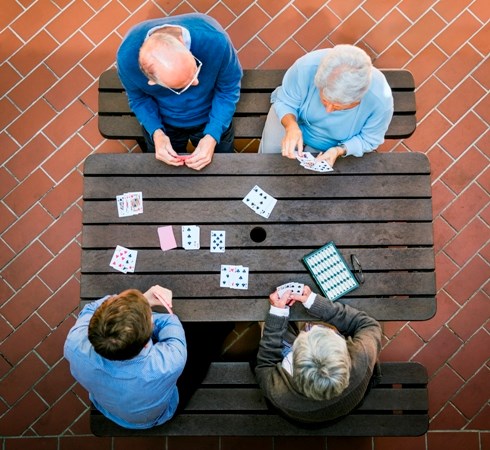 seniors playing cards