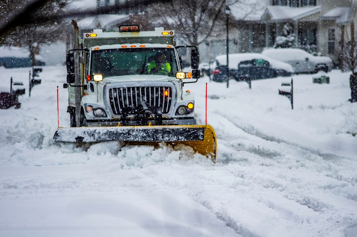 White snowplow service truck