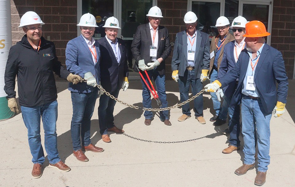 Premier Scott Moe and other dignitaries at the chain cutting, to official open the Sask. Oil and Gas Show.
