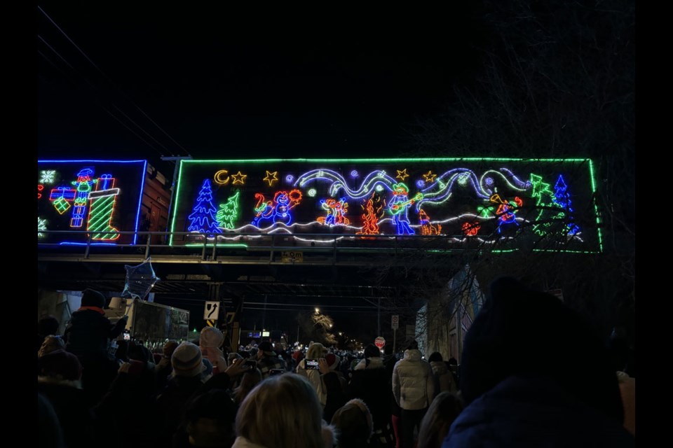 At dark, the CP Holiday Train glowed along the tracks, stopping in communities to raise donations for local food banks.