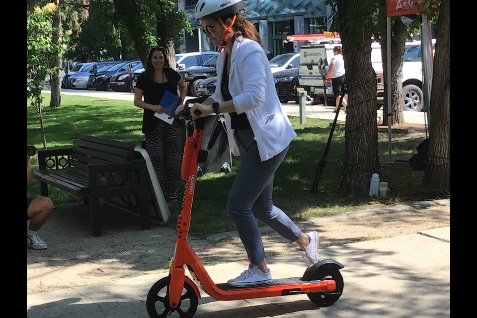 Mayor Sandra Masters tried out the Neuron e-Scooter introduced to Regina.