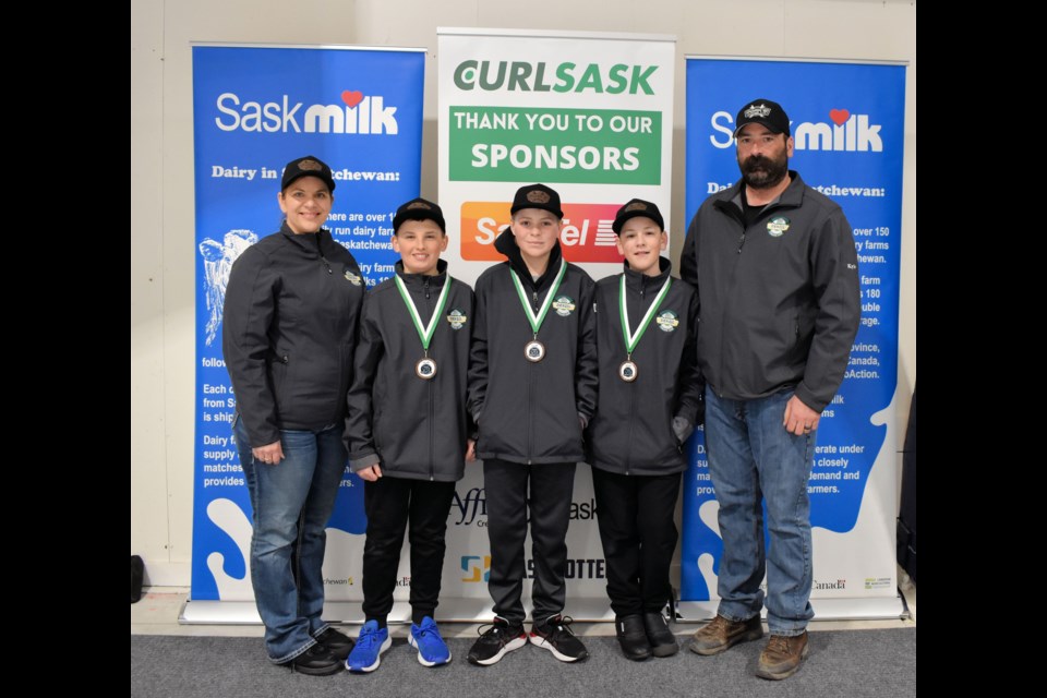 Bronze medallists in Saskatchewan U12 triples curling: Carrie Reiniger, Luke Laturnus, Aiden Whittleton, Hayden Reiniger and Kyle Reiniger.