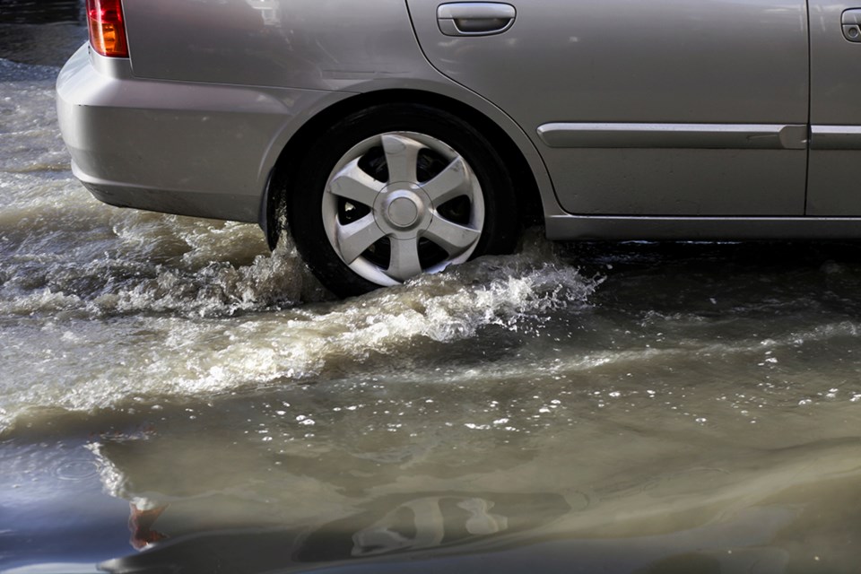 car in flooded street