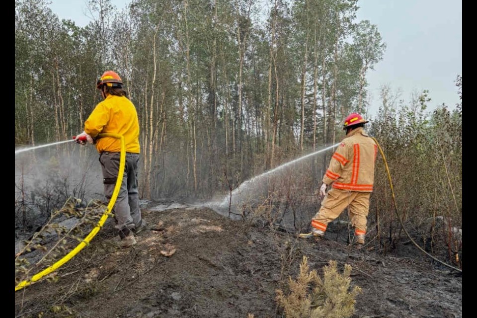 Two CRCC Wildfire crews work to contain fires in the assigned area.