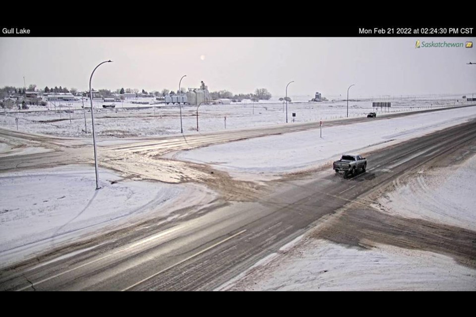 This a screenshot from the Highway Hotline camera just after 2 p.m. Monday of Highway 1 at Gull Lake. Travel is still not recommended in that area. Click through to see the same intersection Sunday evening.