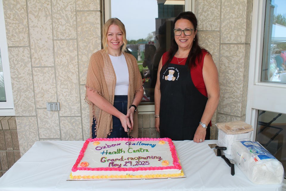 From left, community health services manager Amana Chicoine and president of the health care auxiliary Donna Nyeste preparing to dish out dessert. 