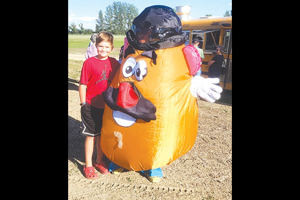 A potato mascot was busy greeting children and adults throughout the day
