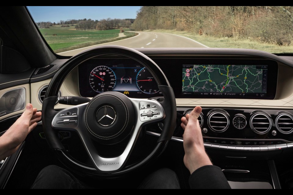 The 2018 Mercedes-Benz S-Class isn't fully autonomous, but its drive is close to that. Here, the car negotiates a curve by itself, without wandering between the solid line on the right and the dotted centre line. Credit Mercedes-Benz
