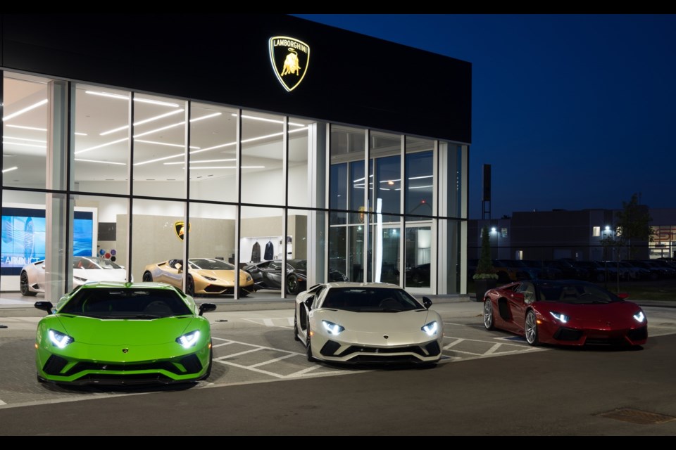 Lamborghini Uptown in Vaughan - Green, White and Red Aventadors parked outside to replicate the colors of the Italian flag. Credit Lamborghini