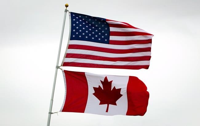 In D.C. bar, Canadians in international affairs cheer end of the Harper era