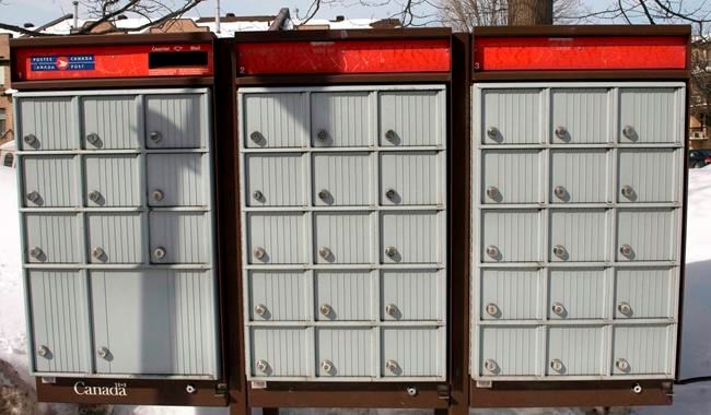 Canadian Press NewsAlert: Canada Post suspends community mail box program