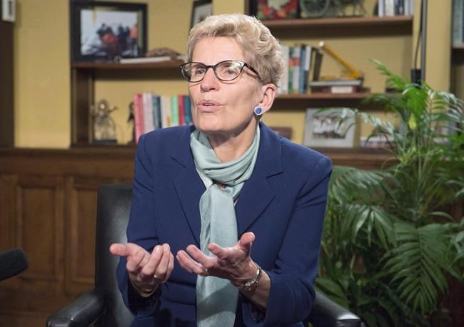 Wynne says Ontario is preparing protocols for physician-assisted death
