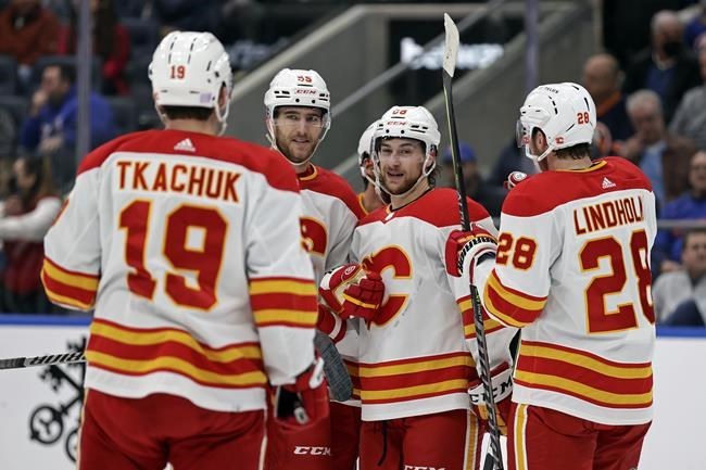 Flames spoil opening of Islanders' new arena