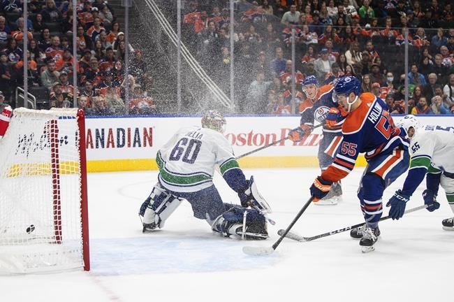 McDavid, Hyman score in 3rd, Oilers rally to beat Flames 3-2 - Seattle  Sports