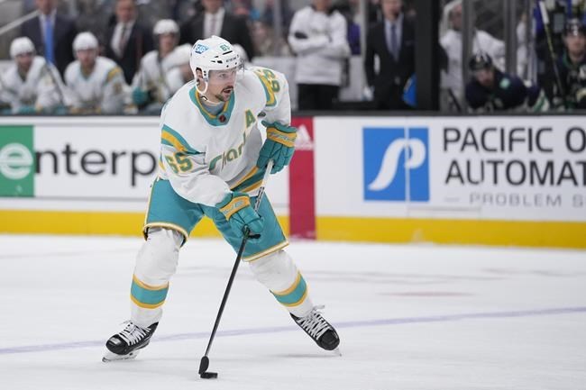 NHL Roundup: Canucks Win as Andrei Kuzmenko Scores in Overtime