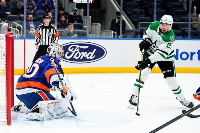 Dallas Stars' Jason Robertson celebrates after scoring a goal during the  first period of an NHL hockey game against the New York Islanders Tuesday,  Jan. 10, 2023, in Elmont, N.Y. (AP Photo/Frank